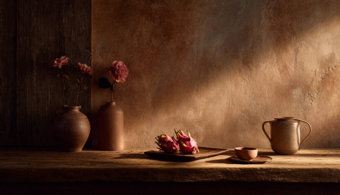 Rustic still life of dragon fruit on wooden tray with warm brown background in 16:9 format